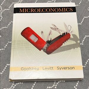 Economics Textbook with White Cover